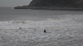 Scarborough Surfers brave the winter weather to catch some big waves