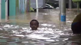 Hundreds of homes severely flooded in parts of Indonesian capital