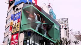 Giant cat on Japanese billboard appears again with a robot vacuum