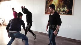 Palestinians with disabilities take part in a performing arts training class