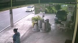Woman dodges deadly loose wheel bouncing towards her head in Thailand