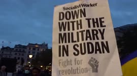 'Down with the mililtary in Sudan' demand protesters in Trafalgar Square in London