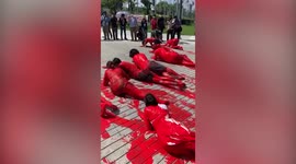 Protesters make graphic human blood art in Thailand