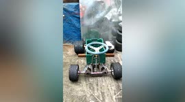 Artist creates go-kart from used beer crates
