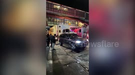 Truck gets stuck under a low hanging Subway station in New York City