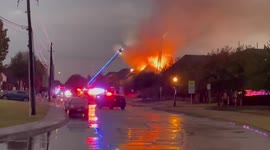 Firefighters battle to save house set ablaze by lightning in Texas