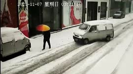 Man has incredibly lucky escape when minibus loses control on snowy street in China
