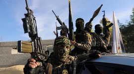 Palestinian militants the Al-Quds Brigades take part in a military parade in Gaza