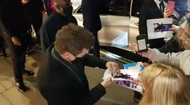 Stars Jeremy Renner and Hailee Steinfield sign autographs before Hawkeye screening