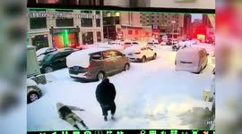 Old Chinese man casually grabs woman’s phone after she drops it on snow-covered road