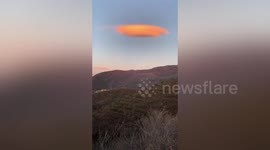 Ominous UFO-shaped cloud spotted above Chinese capital Beijing