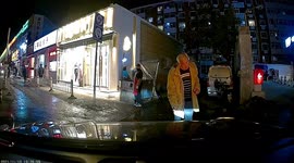 Naughty old man scares Chinese motorist by pretending to be about to scam her