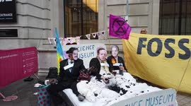 Climate activists stage threesome to call for boycott of London Science Museum, Shell and Adani