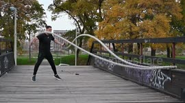 Outdoor workout with a rope and jumping rope