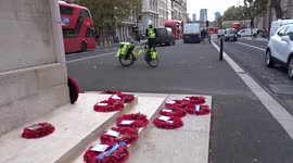 Lest We Forget tributes mount at the Cenotaph on Remembrance Day 2021