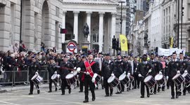British marching band plays music while parading at the Lord Mayor's Show 2021.