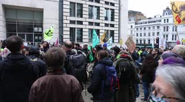 Extinction Rebellion gathers to block road during the Lord Mayor's Show at Blackfriars.