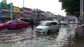 Floods at the Krung Thon Bridge in Bangkok, Thailand, during rainy season