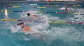 Amputees take to the pool for swimming gala in the Gaza Strip