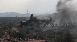 Palestinian protesters clash with Israeli forces during demonstration against settlements in West Bank village of Beita
