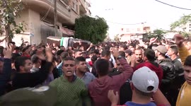 Mourners carry coffin of Abu Abourjeila, who drowned in Mediterranean, at funeral in Gaza Strip