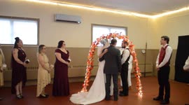 Bride knocked off her feet at a wedding after kiss as she's given away