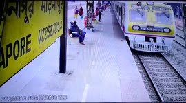 Dramatic moment 72-year-old man is dragged by train till saved by cop