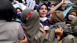 Action Encourages Officers With Asylum Seekers From Afghanistan and Iraq Demonstration in Front of the UHNCR Office, Central Jakarta. Indonesia