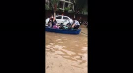 Flood water flooded the city after heavy rains caused damage to many vehicles on the road