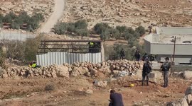 Israeli security forces confiscate barracks in the Palestinians residential area after Israeli authorities said it was built without a permit in Yatta south
