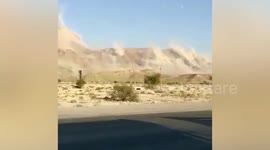 Iran earthquake shakes trucks stopped on road