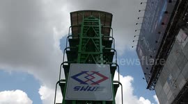 Robotic vertical parking system opens at subway station in Bangkok to reduce traffic