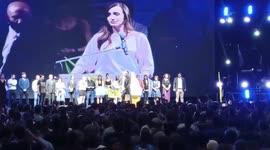 Security guard threatens to pull gun on audience member during political rally
