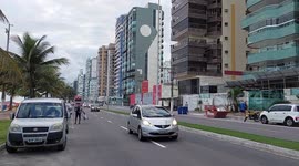 Santa Claus is arriving in Brazil near the beach where there is no snow