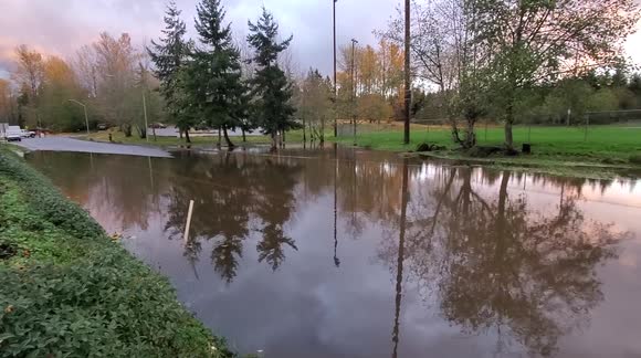 Cars abandoned due to road flooding in a Pacific Northwest Washington Bellingham after heavy rainstorm