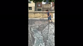 'Boy jumps over HYPER-REALISTIC 3D street art in England '