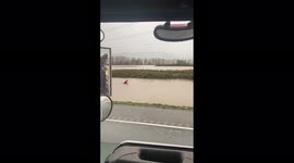 Canada: Cyclist Plows Through Flooded Road In British Columbia 2