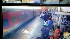 Passenger gets dragged along moving train, rescued in western India