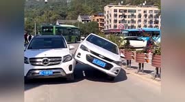 Chevrolet tipped into air after hitting another vehicle in China