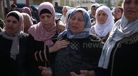 Mourners carry body of Palestinian killed during clashes with Israeli forces
