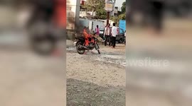 Bike catches on fire amid petrol pump premises in central India