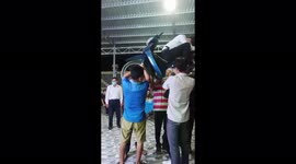 Motorhead! Vietnamese woman balances man and motorbike on her head