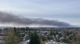 Fire in British Columbia in Canada sends plume of smoke across the sky