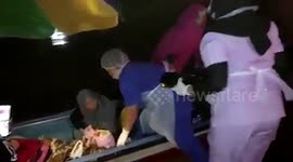 Mother gives birth on boat during floods in Indonesia