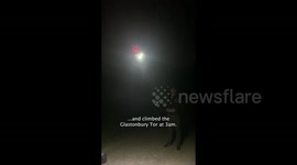 OH HALO! PHOTOGRAPHER LIGHTS UP GLASTONBURY TOR WITH MAGNIFICENT HALO THAT COULD BE MISTAKEN FOR A UFO LANDING