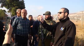 Palestinian protesters block a road after Israeli security forces and settlers prevented Palestinian students from heading to their school in al-Lubban al-Sharqiya village