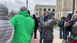 Anti-racism protesters verbally abuse pro-Rittenhouse activist outside Kenosha courthouse