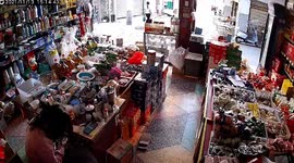 Woman 'steals gallon of vegetable oil' while shopkeeper fiddles with phone