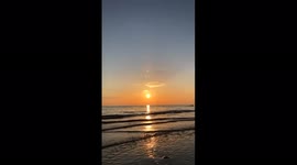 sunset beach scene from blackpool pleasure beach