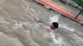 Locals resort to swimming on waterlogged streets in southern India